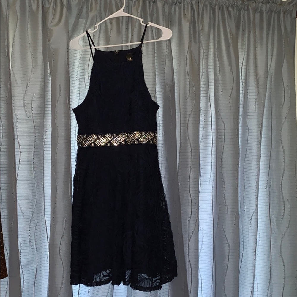 A navy blue dress with diamond decals